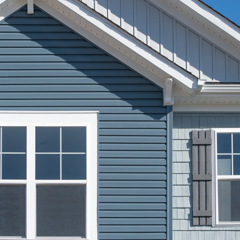 Picture of a siding on the house under intense sunlight